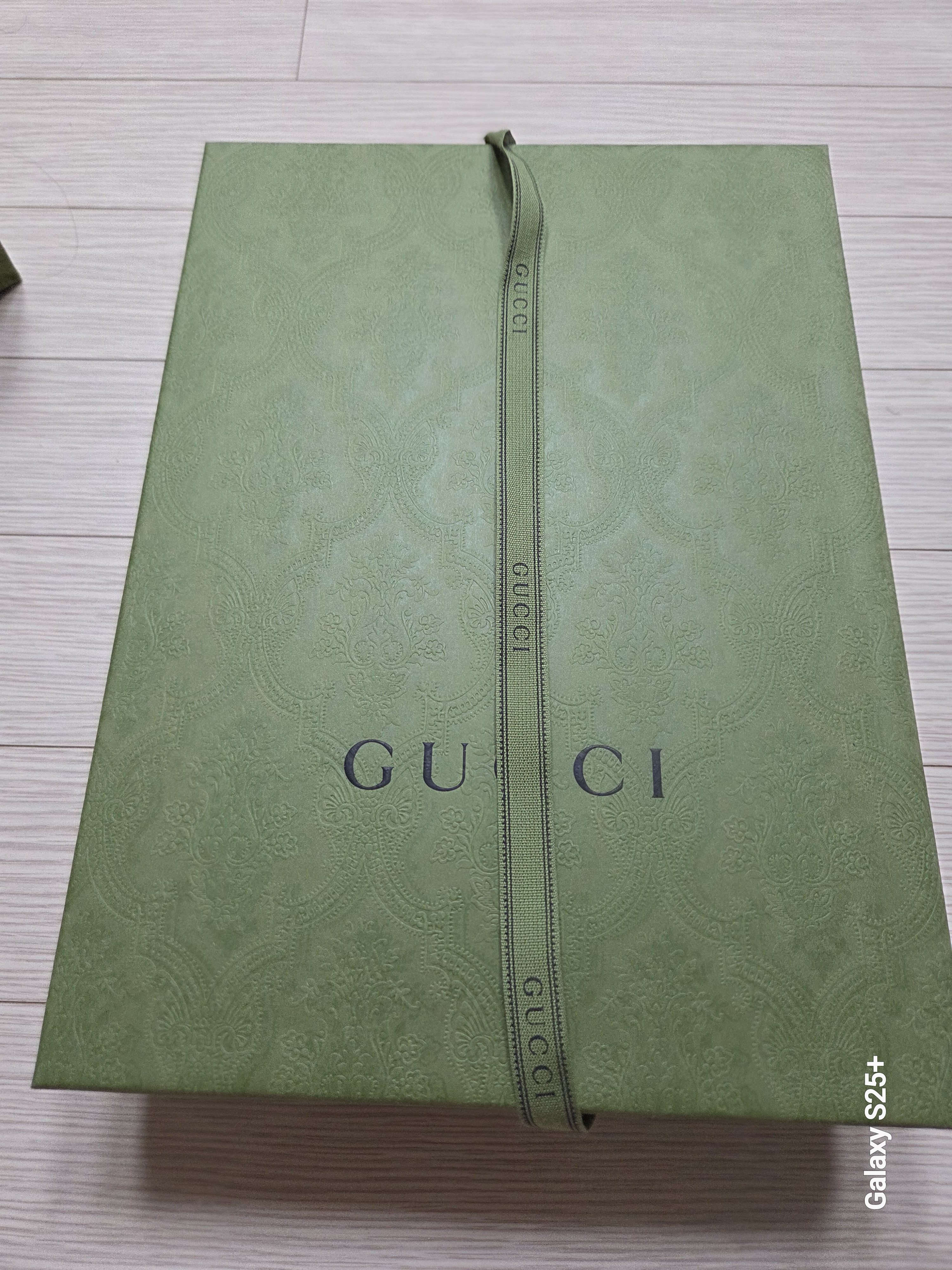 구찌GG 슈프림 클러치